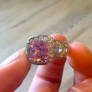 Pink crystal ring with fake diamonds.